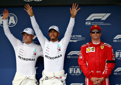 Hungarian Grand Prix: Lewis Hamilton takes superb pole in wet conditions