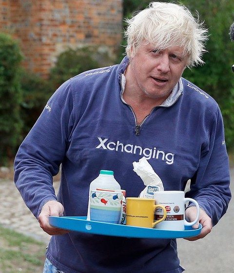 Boris Johnson emerges from his home with cups of tea for journalists as he avoids questions on burka