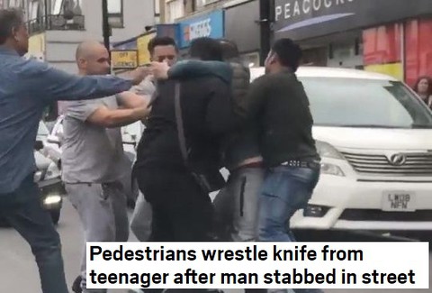 Pedestrians wrestle knife from teenager after man stabbed in street