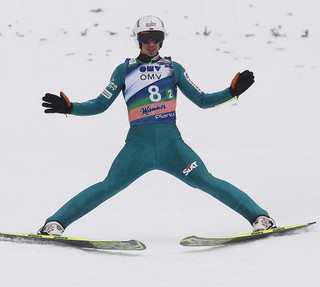Koudelka soars to glory in windy Lillehammer.Two Poles in final in Lillehammer