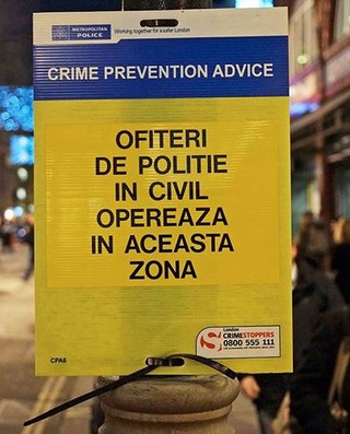 Police warn pickpockets targeting Christmas shoppers with sign written in Romanian