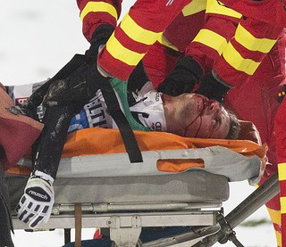 Simon Ammann left bloodied and unconscious after crash