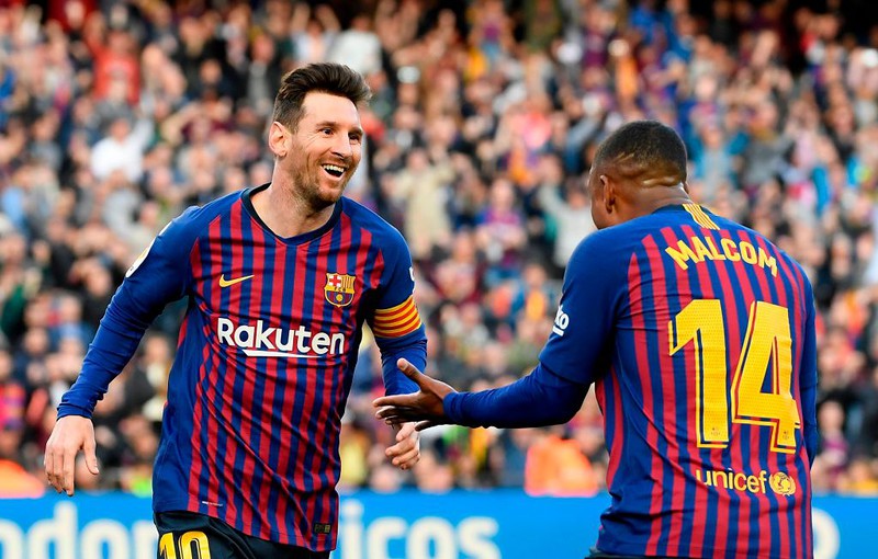 Barcelona 2-0 Espanyol: Lionel Messi scores late derby double