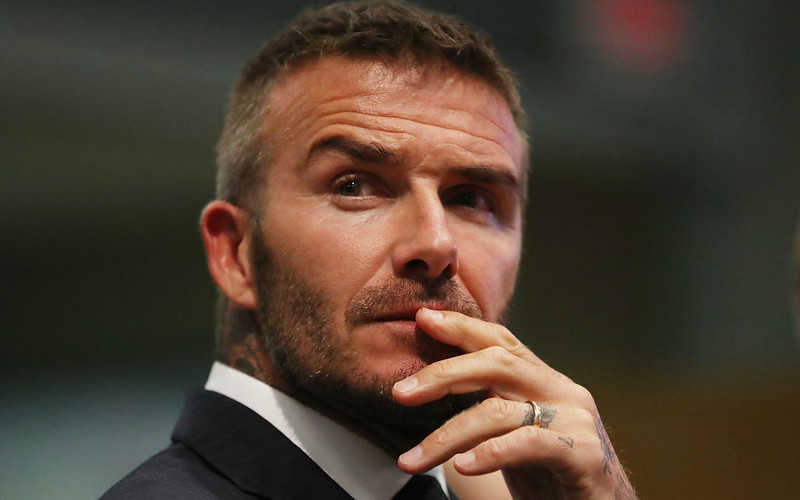David Beckham faces driving ban after being caught on phone while driving