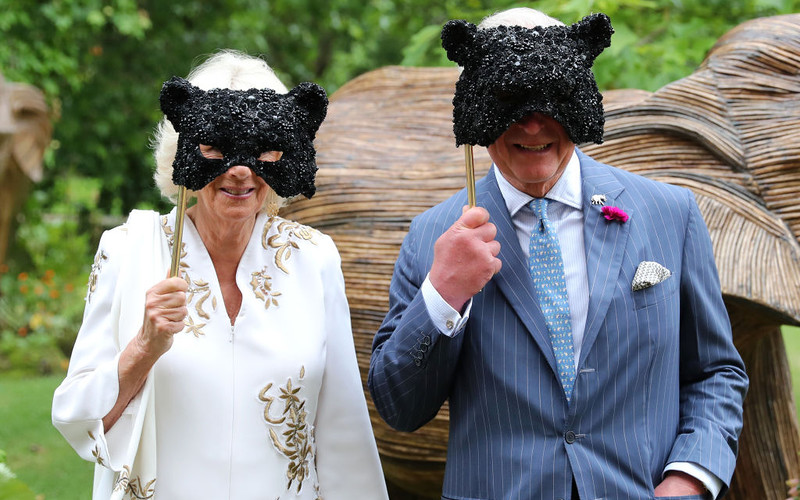Prince Charles and Camilla don glittery masks as they host annual Animal Ball at Clarence House 