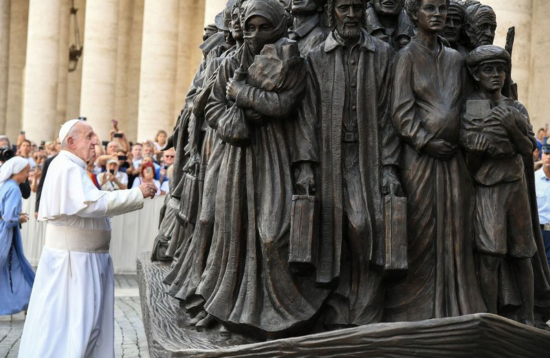 Pope unveils sculpture commemorating migrants and refugees