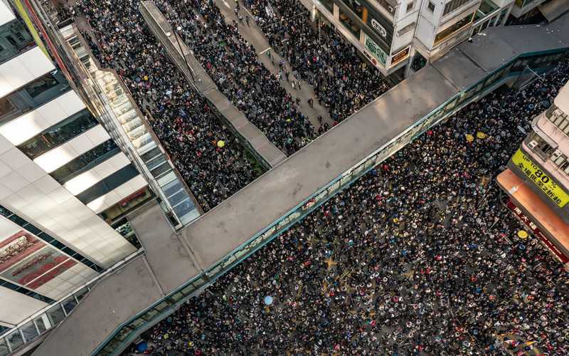 In Hong Kong, tens of thousands of people are walking on a pro-democratic march