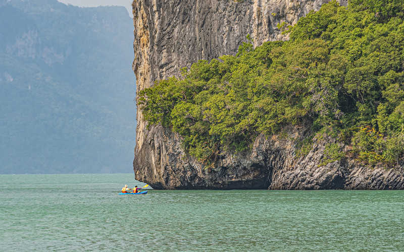 Thailand: A Pole's kayak lifted into the open sea