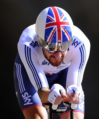 Sir Bradley Wiggins breaks cycling's hour record