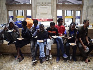 Station chaos deepens Italy migrant crisis