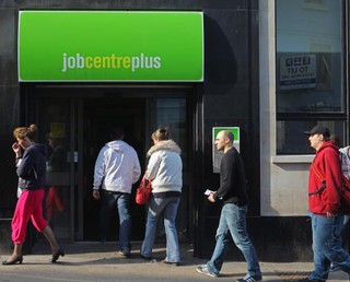 UK unemployment falls as wages rise