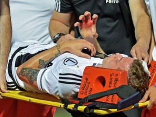 Legia Warsaw match abandoned after midfielder Ondrej Duda is hit with a stone thrown from the crowd 