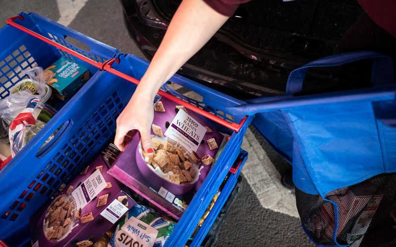 Tesco limits online orders and asks people to go to the shops as panic buying continues