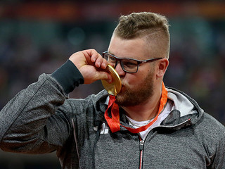 Champion hammer thrower denies paying for taxi with gold medal after night out celebrating
