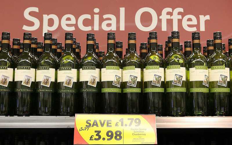 Shoppers swap clothes for alcohol amid record sales drop
