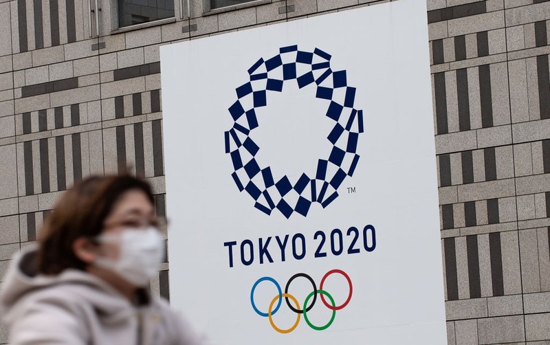 Tokyo Olympics protest parody of logo that depicts COVID-19