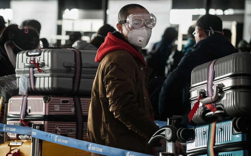 Flights canceled, communities fenced off as coronavirus' return plunges Beijing into "soft lockdown"