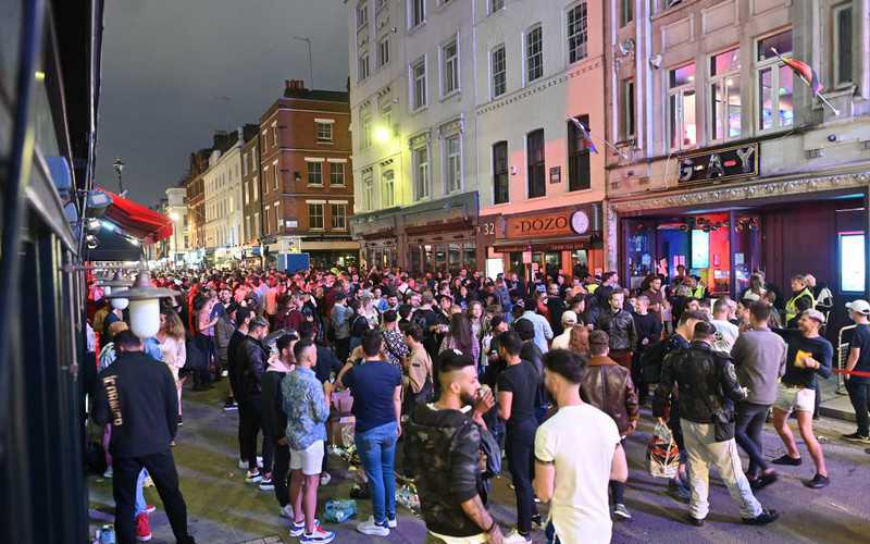Brits party well into the morning on chaotic first night of pubs reopening