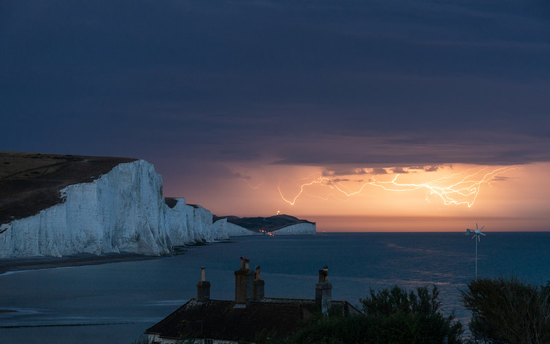 Thunderstorms and flash flooding to last until Monday bringing end to heatwave