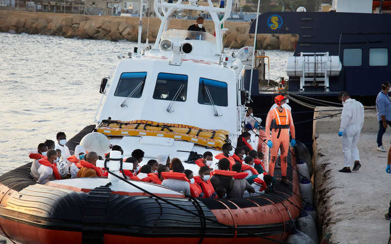 Italian coastguard mounts operation to retrieve refugees  from Banksy's migrant boat