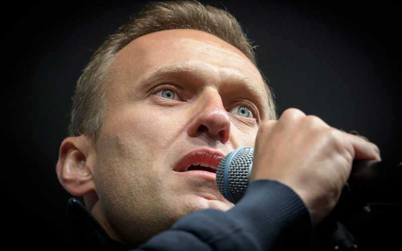 Russian opposition leader Alexey Navalny is out of a coma, hospital says