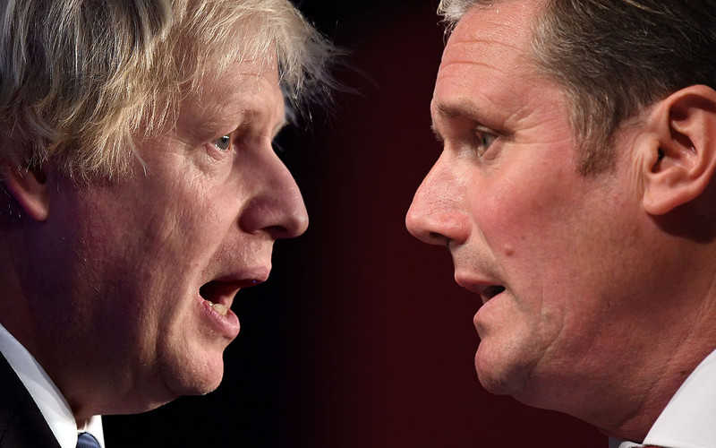 Johnson defends Covid-19 strategy as Starmer demands short lockdown from Friday