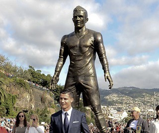 Messi name on Ronaldo sculpture
