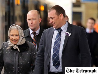 Queen rides with commuters on train back to London