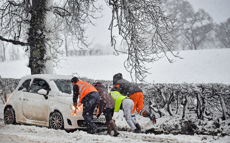 Snow and ice brings disruption to parts of UK as people warned not to travel