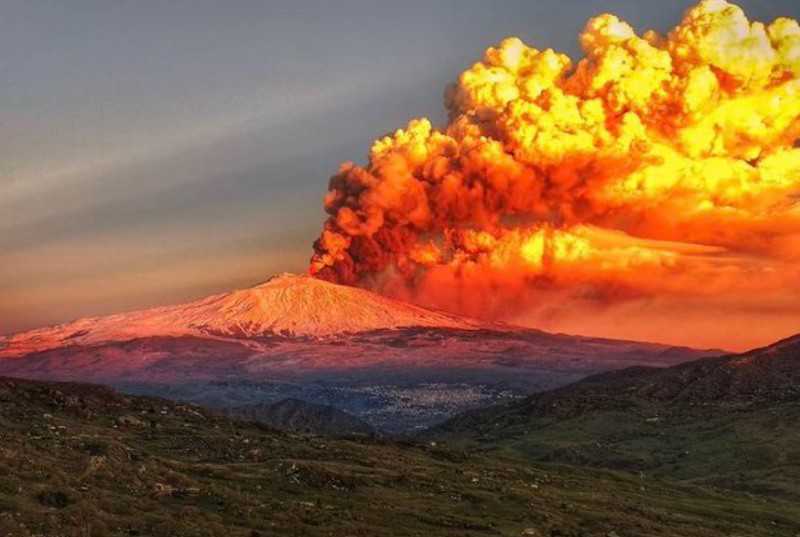 Sicily residents watch on as an erupting Mount Etna sends ash clouds into air