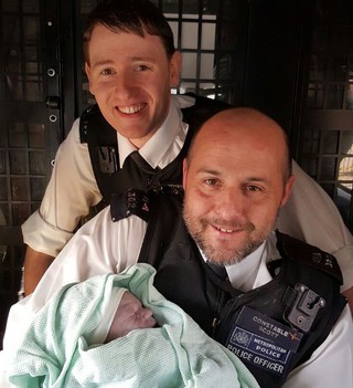 Police officers speak out after helping woman give birth on street