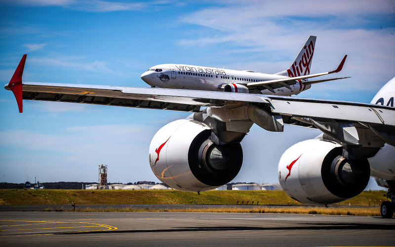 Half price flights break Virgin Australia sales record, send Qantas and Jetstar soaring