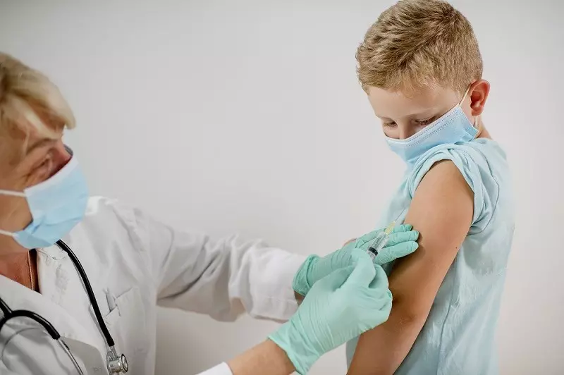 UK Oxford-AstraZeneca COVID vaccine trial in children paused