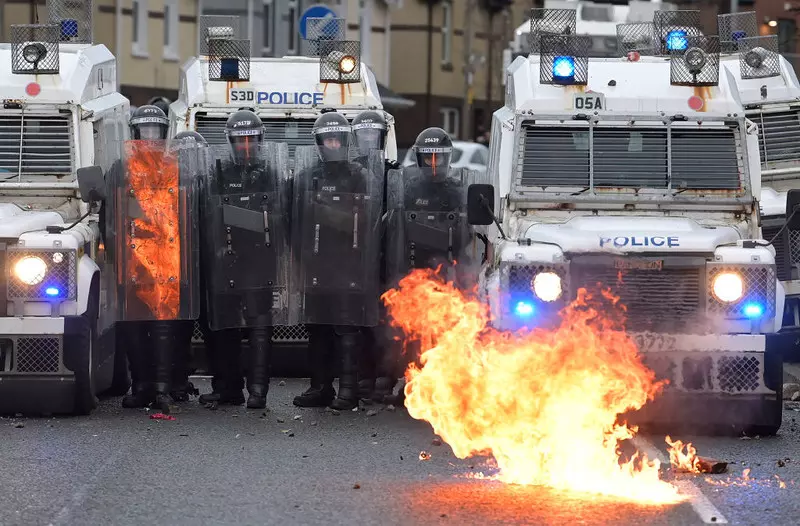In Belfast, sporadic attacks on the police despite mourning after Philip's death