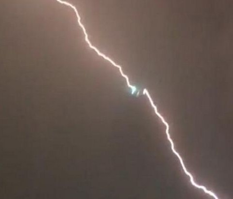 Moment lightning strikes plane landing at Heathrow