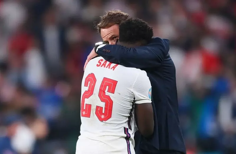England team ‘disgusted’ by racist abuse sent to players after final loss as police investigate