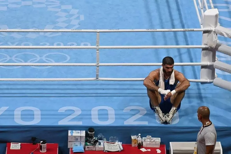 France's Mourad Aliev refuses to leave ring in protest after DQ loss at Tokyo Olympics