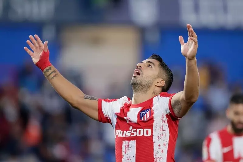 Late Suarez double gives Atletico 2-1 win at Getafe in Spain
