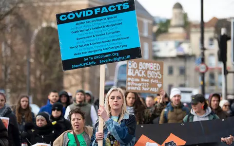 Anti-vaxxers turn up at police HQ to report Covid vaccine for ‘attempted murder’