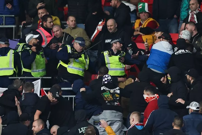 Hungary fans clash with police during England's World Cup qualifier at Wembley Stadium