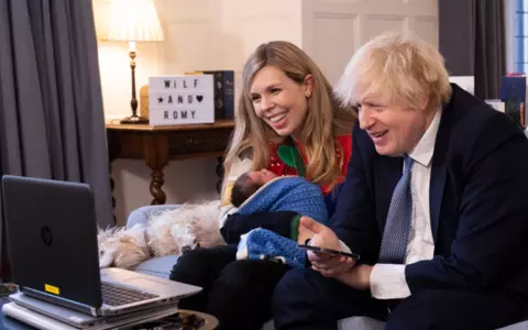 Boris and Carrie Johnson pictured with newborn daughter Romy