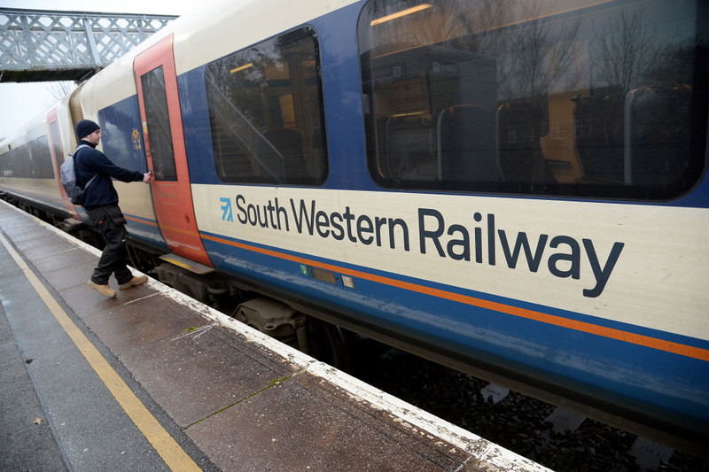UK train services cut due to Covid staff absences