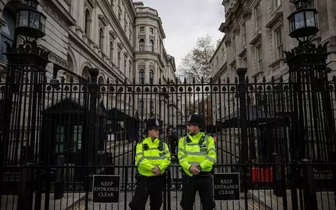 Man held on attempted murder after police threatened at Horse Guards