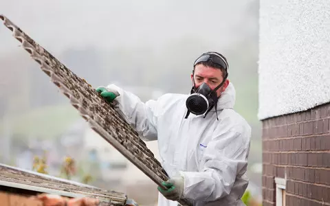 MPs say asbestos must go from public buildings within 40 years