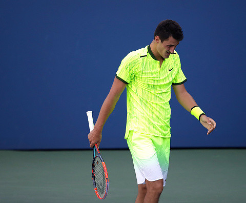Bernard Tomic fined $13,300 for crude response to US Open heckler