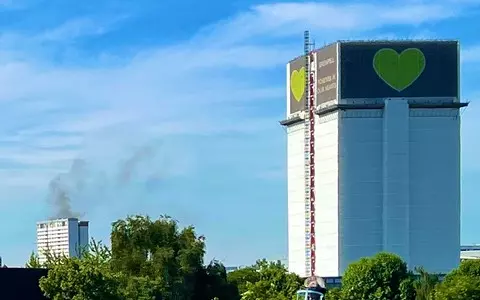 People being treated by paramedics at tower block blaze near Grenfell