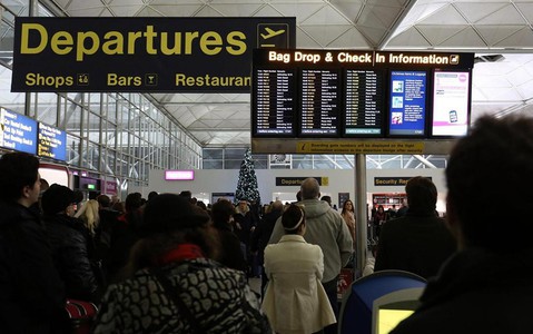 London airport passengers face walks of up to a kilometre to catch flights