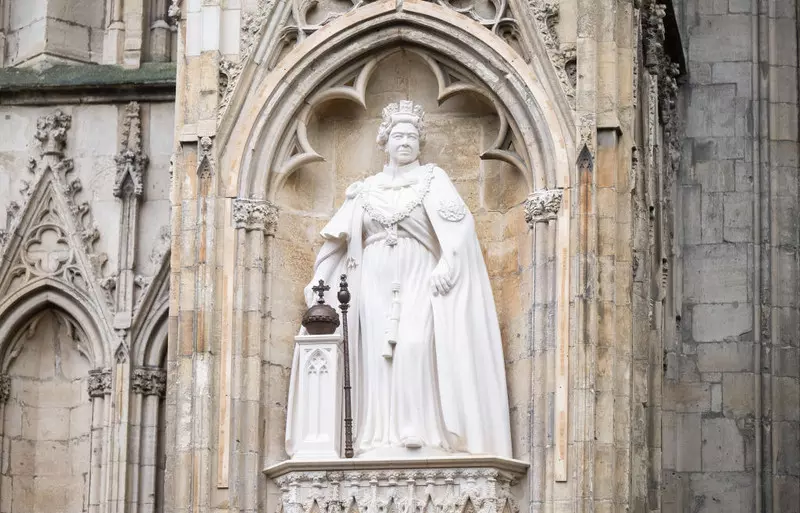 King Charles unveils first statue of Queen since her death