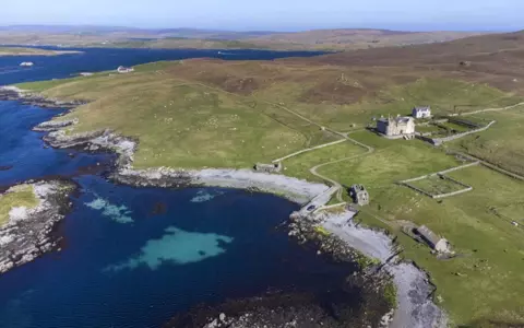 Polish woman and her English husband sell private island with comfortable castle