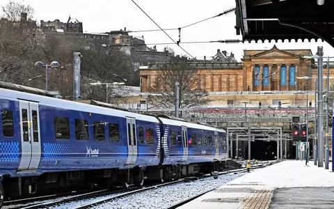 Rail strikes and wave of frost and snow paralyse transport in UK